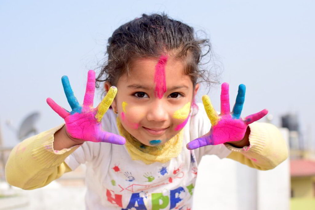 Child Playing Holi