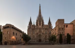 Main facade of Barcelona Cathedral at sunrise