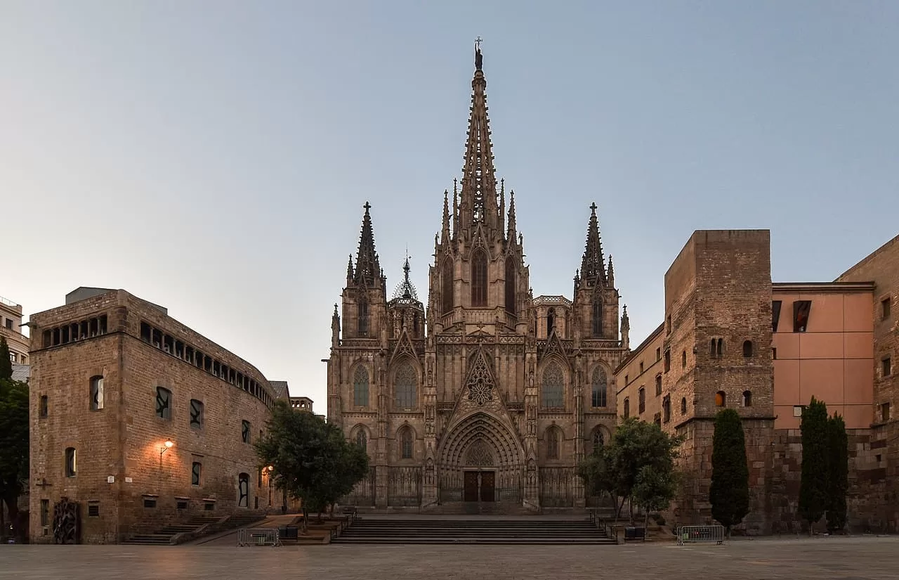 Main facade of Barcelona Cathedral at sunrise